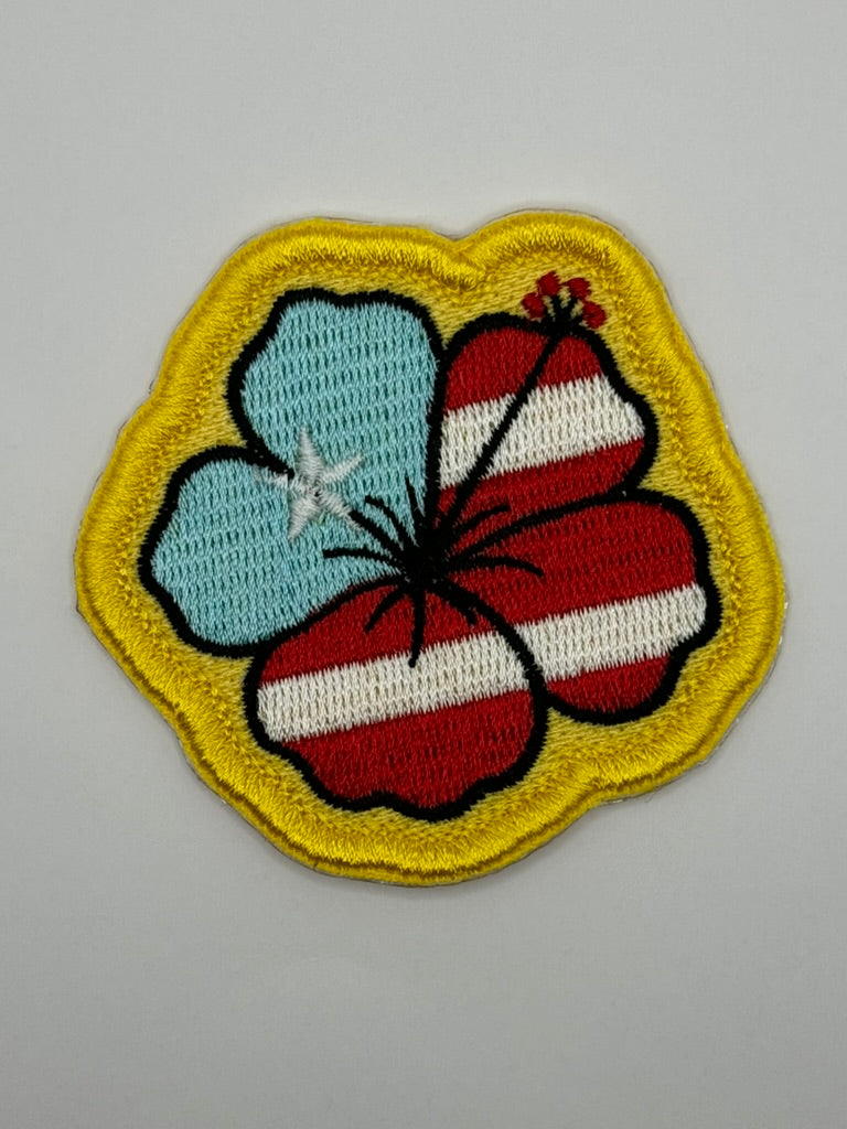 Puerto Rico flag hibiscus embroidered patch

Puerto Rican hibiscus patch with yellow border



Tropical Puerto Rico flower patch on a beach bag

Puerto Rico hibiscus patch backing options


